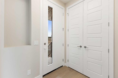 59 Agate Road, Cochrane, AB - Indoor Photo Showing Other Room