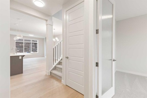 59 Agate Road, Cochrane, AB - Indoor Photo Showing Other Room