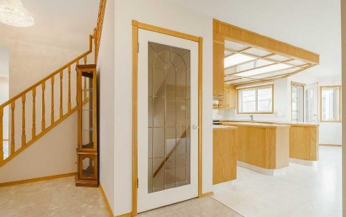 301 Riverview Green, Cochrane, AB - Indoor Photo Showing Other Room