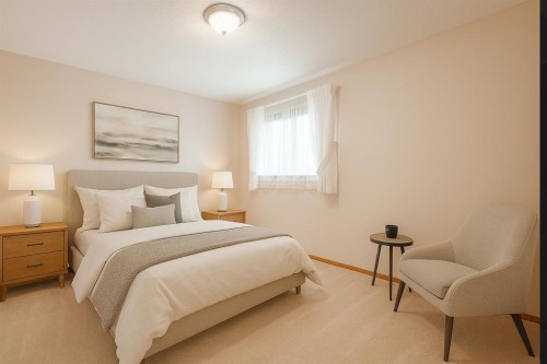 301 Riverview Green, Cochrane, AB - Indoor Photo Showing Bedroom