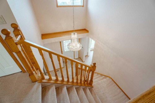 301 Riverview Green, Cochrane, AB - Indoor Photo Showing Other Room