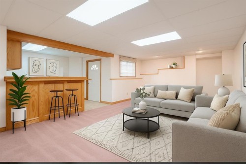 301 Riverview Green, Cochrane, AB - Indoor Photo Showing Living Room