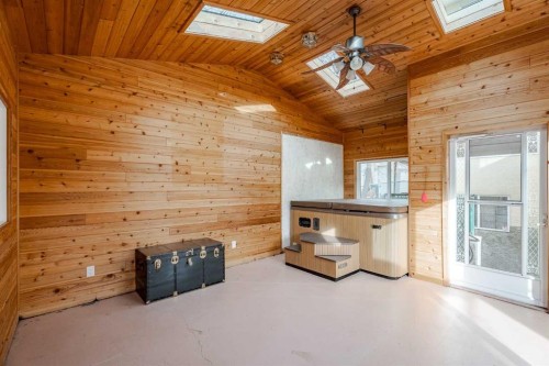 301 Riverview Green, Cochrane, AB - Indoor Photo Showing Other Room