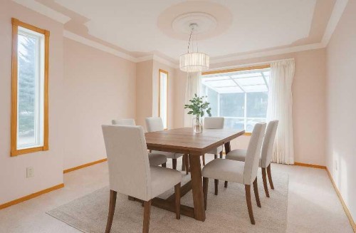 301 Riverview Green, Cochrane, AB - Indoor Photo Showing Dining Room