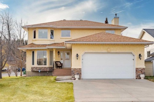 301 Riverview Green, Cochrane, AB - Outdoor With Deck Patio Veranda