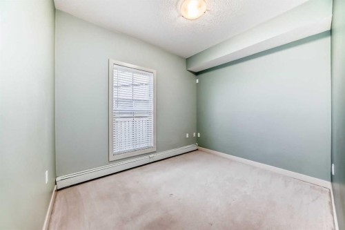 103-4704 Stanley Road Sw, Calgary, AB - Indoor Photo Showing Other Room