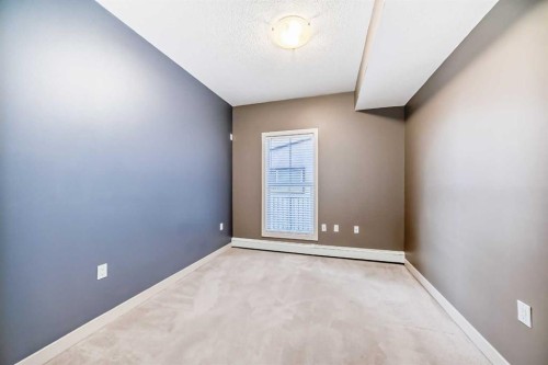 103-4704 Stanley Road Sw, Calgary, AB - Indoor Photo Showing Other Room