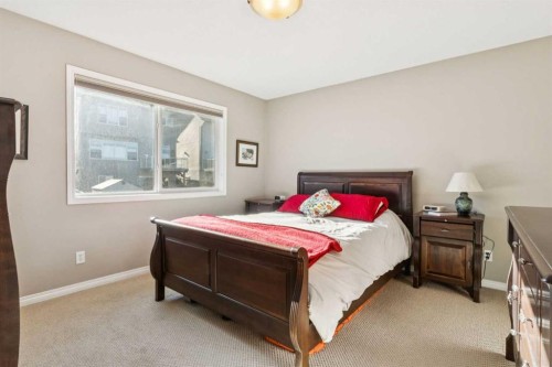 645 Panatella Boulevard Nw, Calgary, AB - Indoor Photo Showing Bedroom