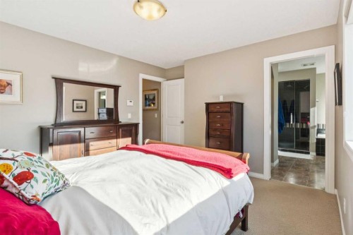 645 Panatella Boulevard Nw, Calgary, AB - Indoor Photo Showing Bedroom