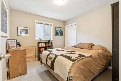 645 Panatella Boulevard Nw, Calgary, AB - Indoor Photo Showing Bedroom