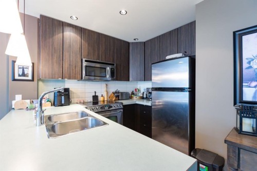 609-788 12 Avenue Sw, Calgary, AB - Indoor Photo Showing Kitchen With Stainless Steel Kitchen With Double Sink