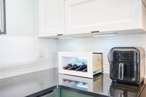 1184 Milt Ford Lane, Carstairs, AB - Indoor Photo Showing Kitchen