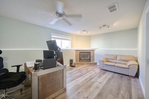 1184 Milt Ford Lane, Carstairs, AB - Indoor With Fireplace