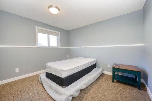 1184 Milt Ford Lane, Carstairs, AB - Indoor Photo Showing Bedroom