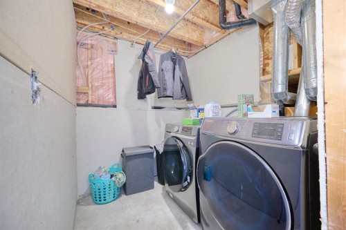 1184 Milt Ford Lane, Carstairs, AB - Indoor Photo Showing Laundry Room