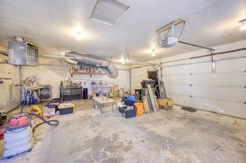 1184 Milt Ford Lane, Carstairs, AB - Indoor Photo Showing Garage