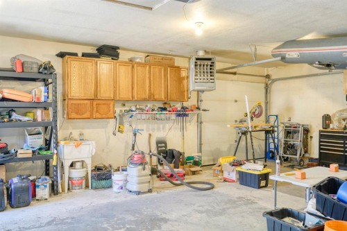 1184 Milt Ford Lane, Carstairs, AB - Indoor Photo Showing Garage