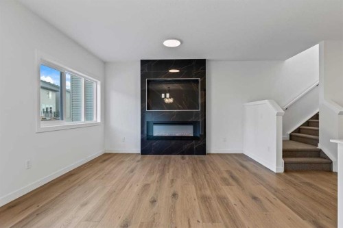 90 Heritage Circle, Cochrane, AB - Indoor Photo Showing Living Room