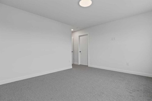 90 Heritage Circle, Cochrane, AB - Indoor Photo Showing Other Room