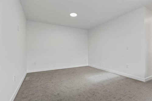 90 Heritage Circle, Cochrane, AB - Indoor Photo Showing Other Room