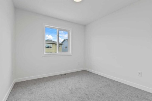 90 Heritage Circle, Cochrane, AB - Indoor Photo Showing Other Room