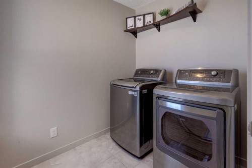 66 Evanscrest Terrace Nw, Calgary, AB - Indoor Photo Showing Laundry Room