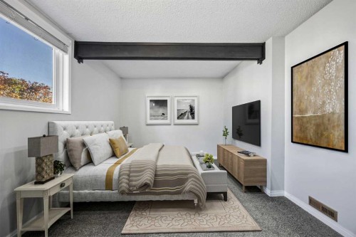 27A-333 Braxton Place Sw, Calgary, AB - Indoor Photo Showing Bedroom