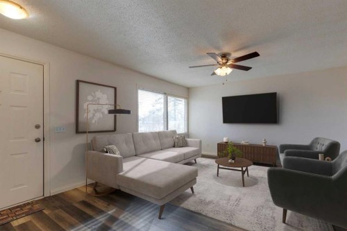 1311 68 Street Ne, Calgary, AB - Indoor Photo Showing Living Room