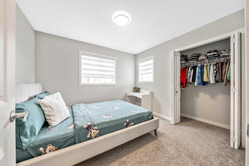 240 Lucas Crescent Nw, Calgary, AB - Indoor Photo Showing Bedroom
