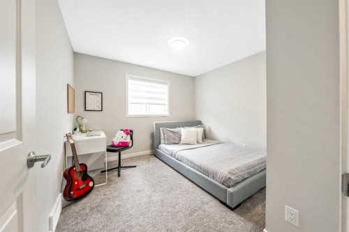 240 Lucas Crescent Nw, Calgary, AB - Indoor Photo Showing Bedroom
