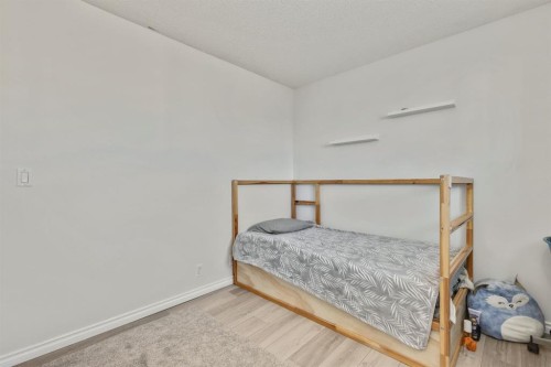1-6412 4 Street Ne, Calgary, AB - Indoor Photo Showing Bedroom