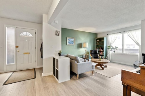 1-6412 4 Street Ne, Calgary, AB - Indoor Photo Showing Living Room