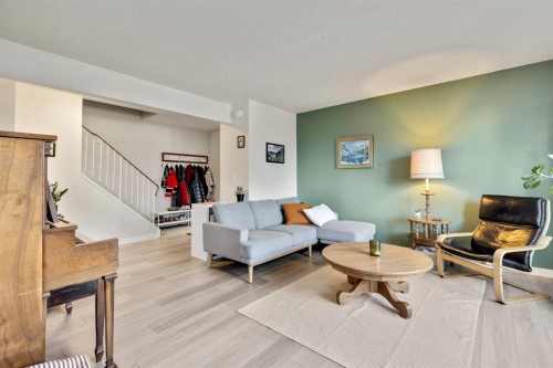 1-6412 4 Street Ne, Calgary, AB - Indoor Photo Showing Living Room