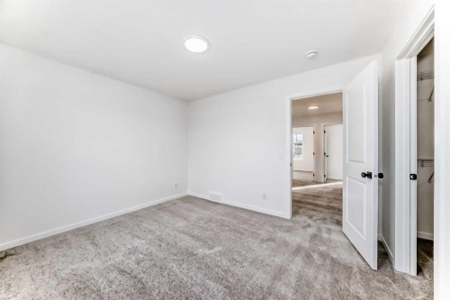 406 Heartland Way, Cochrane, AB - Indoor Photo Showing Other Room