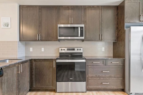 19640 40 Street Se, Calgary, AB - Indoor Photo Showing Kitchen With Stainless Steel Kitchen With Upgraded Kitchen