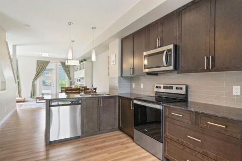 19640 40 Street Se, Calgary, AB - Indoor Photo Showing Kitchen With Stainless Steel Kitchen With Double Sink With Upgraded Kitchen