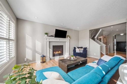 220 Auburn Meadows Crescent Se, Calgary, AB - Indoor Photo Showing Living Room With Fireplace