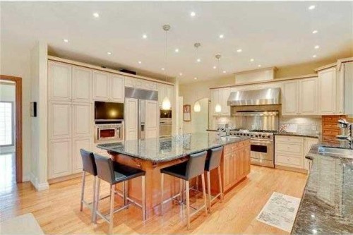 175 Pumpvalley Court Sw, Calgary, AB - Indoor Photo Showing Kitchen With Upgraded Kitchen