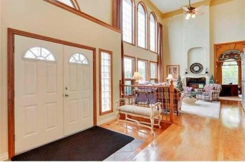 175 Pumpvalley Court Sw, Calgary, AB - Indoor With Fireplace