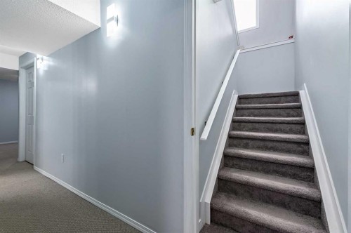 63 Bridlecreek Terrace Sw, Calgary, AB - Indoor Photo Showing Other Room