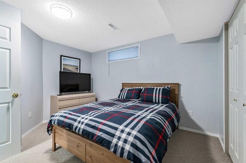63 Bridlecreek Terrace Sw, Calgary, AB - Indoor Photo Showing Bedroom