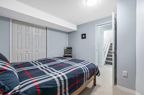 63 Bridlecreek Terrace Sw, Calgary, AB - Indoor Photo Showing Bedroom