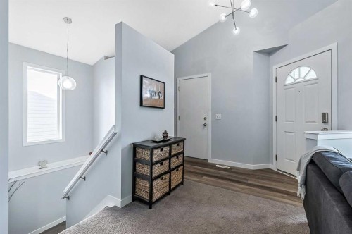 63 Bridlecreek Terrace Sw, Calgary, AB - Indoor Photo Showing Laundry Room