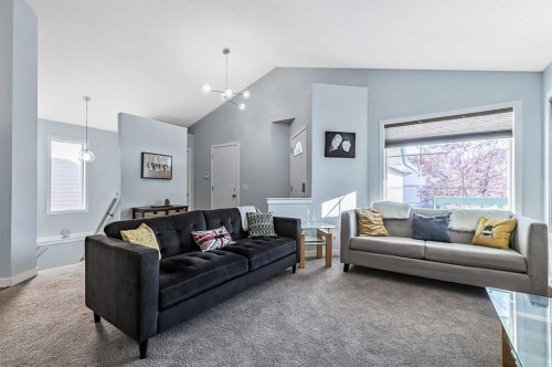 63 Bridlecreek Terrace Sw, Calgary, AB - Indoor Photo Showing Living Room