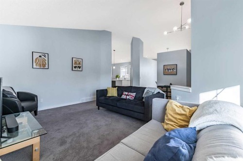 63 Bridlecreek Terrace Sw, Calgary, AB - Indoor Photo Showing Living Room