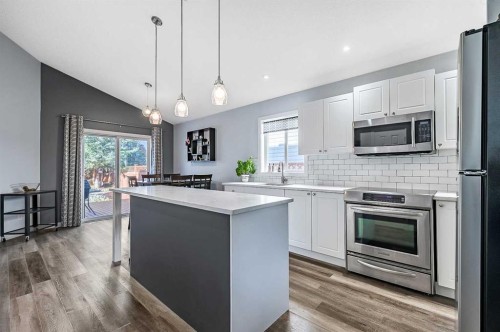 63 Bridlecreek Terrace Sw, Calgary, AB - Indoor Photo Showing Kitchen With Stainless Steel Kitchen With Upgraded Kitchen