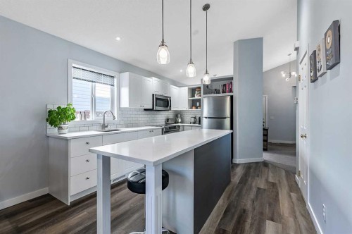 63 Bridlecreek Terrace Sw, Calgary, AB - Indoor Photo Showing Kitchen With Upgraded Kitchen
