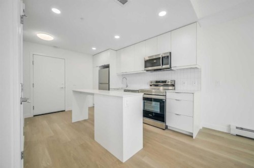 2110-8500 19 Avenue Se, Calgary, AB - Indoor Photo Showing Kitchen