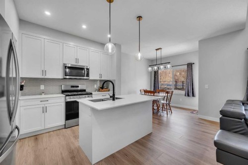 3021 Key Drive Sw, Airdrie, AB - Indoor Photo Showing Kitchen With Upgraded Kitchen