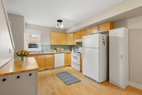 225 Bridlewood Lane Sw, Calgary, AB - Indoor Photo Showing Kitchen With Double Sink
